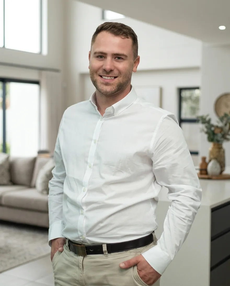 Luke Craddock, estate agent at Leadhome Properties in Kempton Park, standing in a bright modern living room